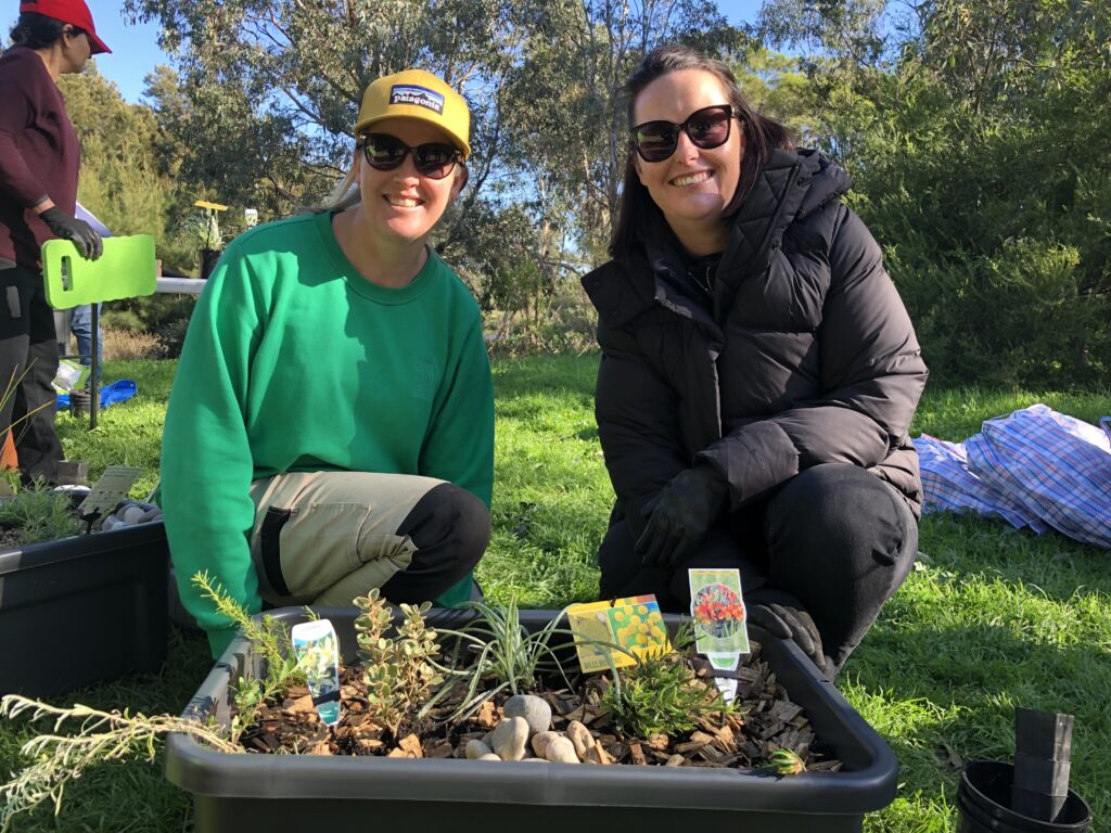 Catherine and Amanda from Coles with their Nature Block. 
